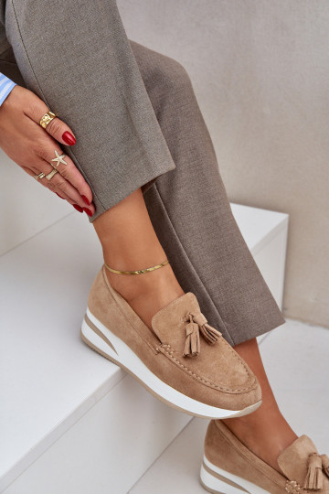 Moccasins On A Delicate...