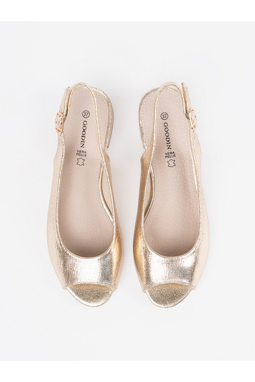 copy of gold color sandals on a loIn...