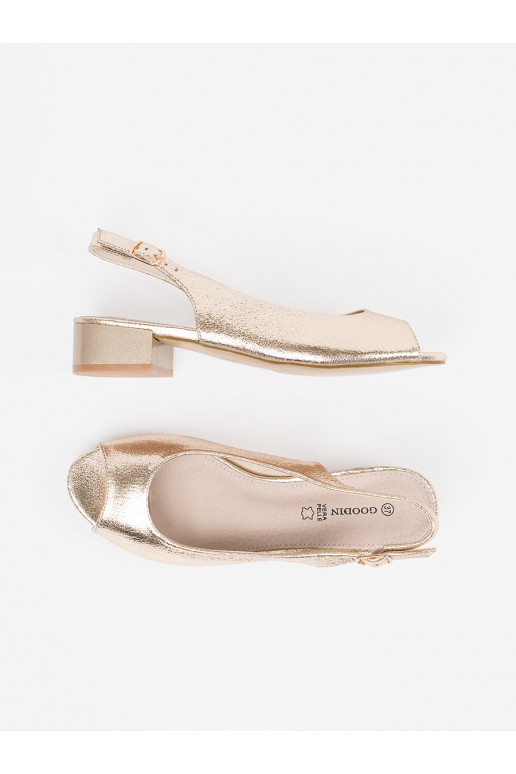 copy of gold color sandals on a loIn...