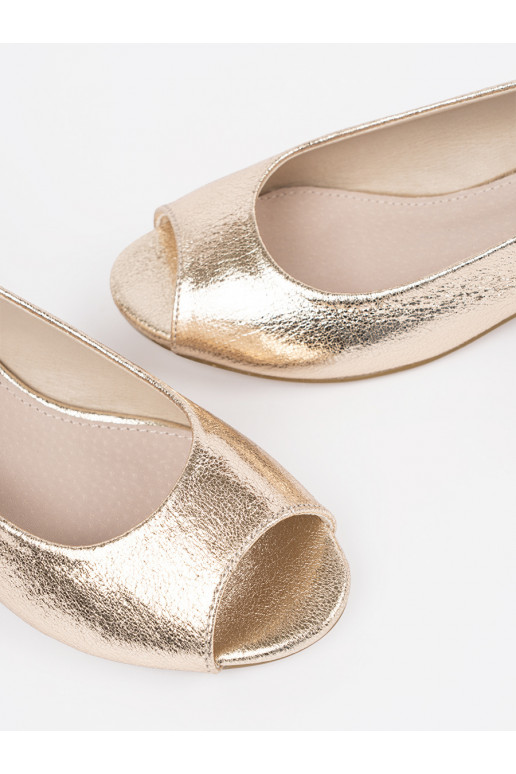 copy of gold color sandals on a loIn...