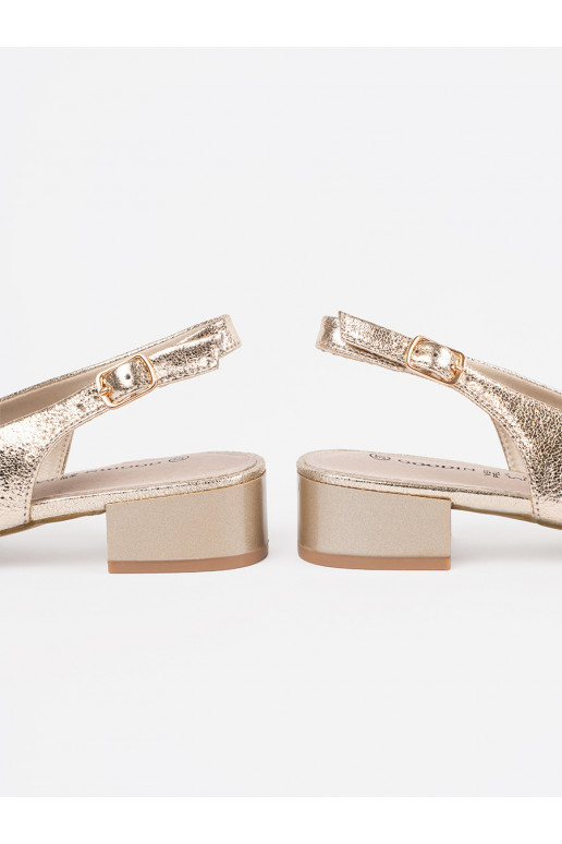 copy of gold color sandals on a loIn...