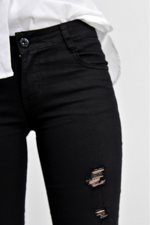 Black skinny pants with rips