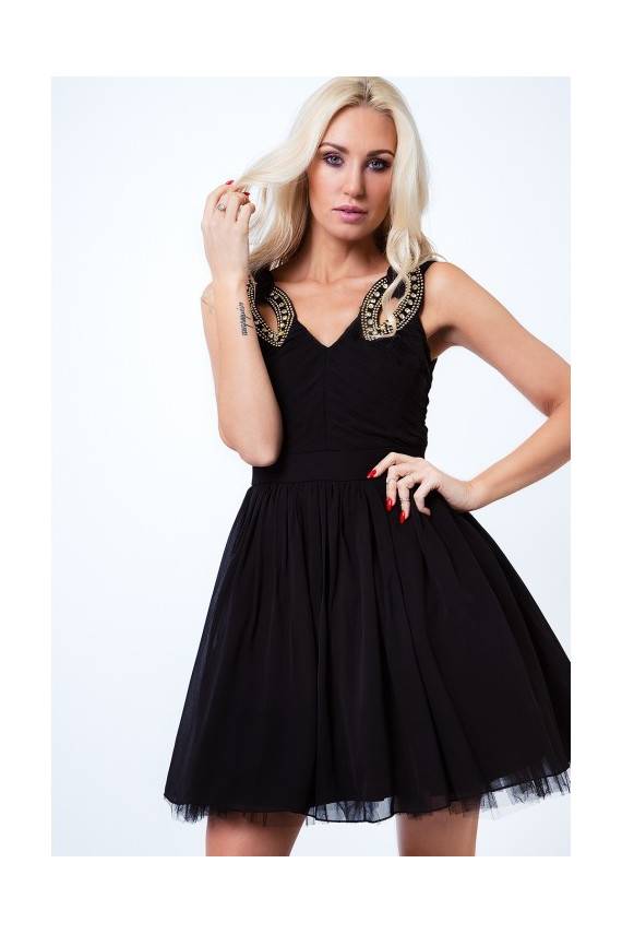 Party dress with opewnwork sleeves and neckline