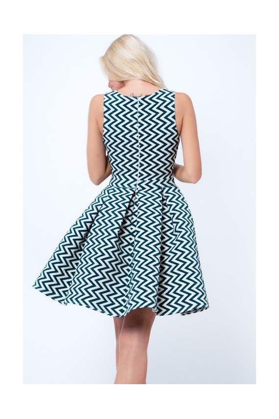 Party dress with opewnwork sleeves and neckline