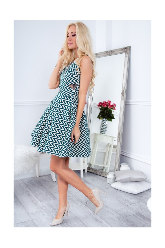 Party dress with opewnwork sleeves and neckline