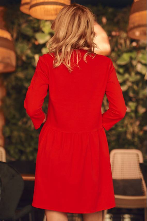 The dress with buttons in red color
