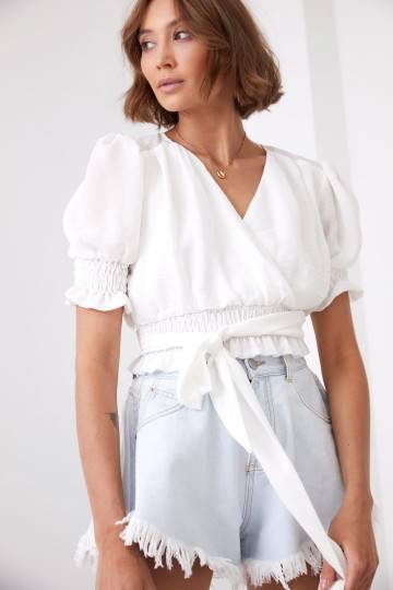 Short blouse with strap cream colors