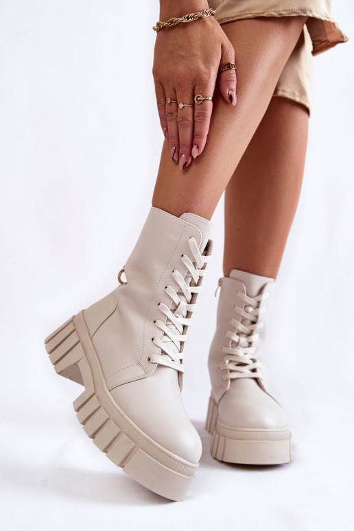 Leather, insulated boots on a platform light beige Telisa 
