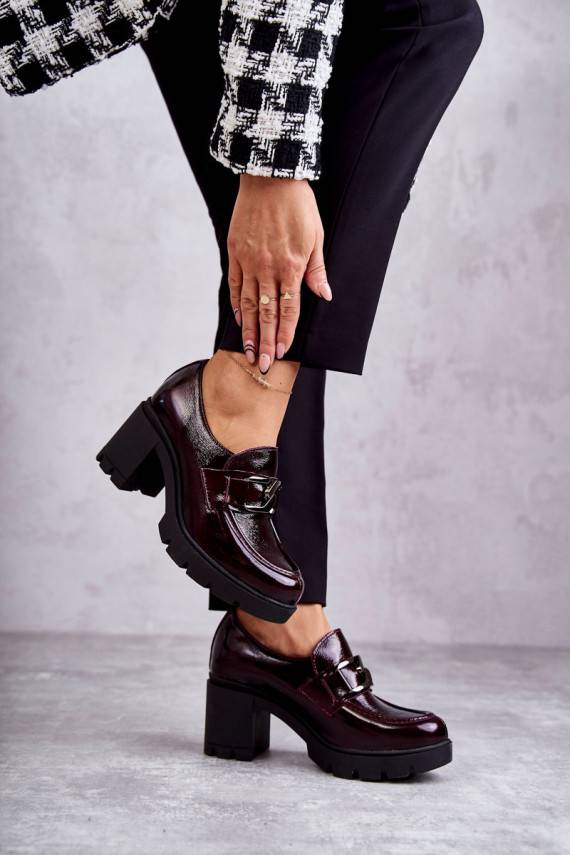 Elegant shoes on a pillar With Silver Ornament Red Harmell