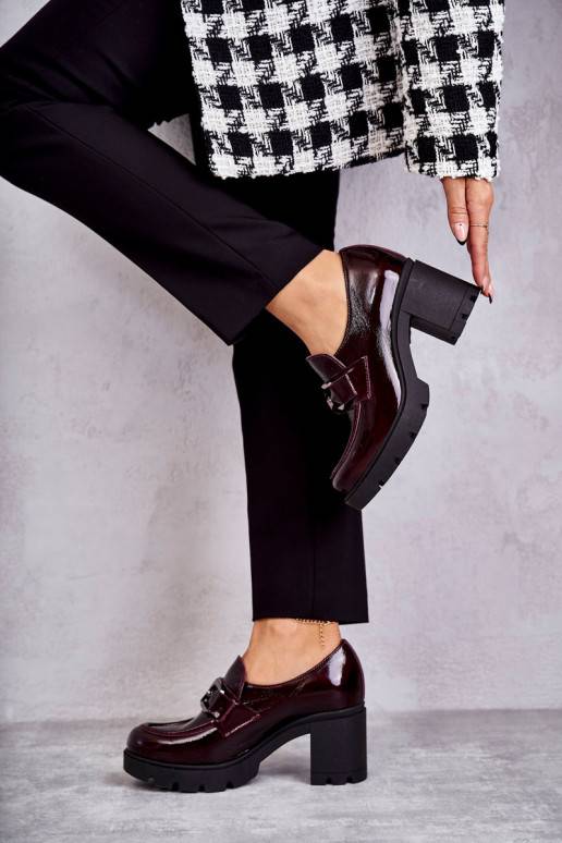 Elegant shoes on a pillar With Silver Ornament Red Harmell