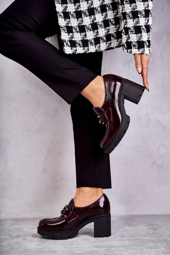 Elegant shoes on a pillar With Silver Ornament Red Harmell