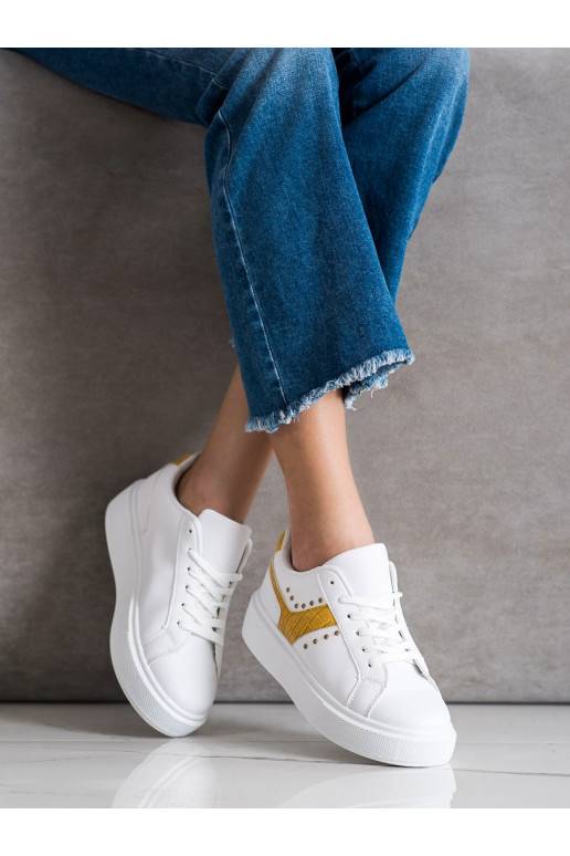 White color Sneakers model shoes Shelovet z żółtym paskiem